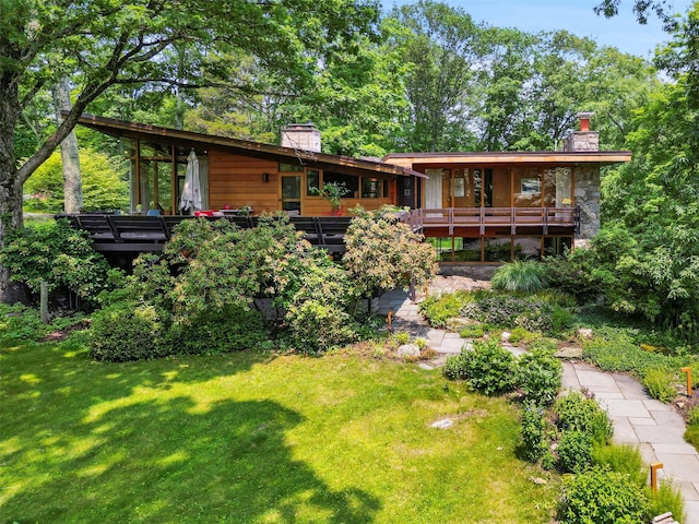 280 Salem Rd, Pound Ridge, NY 10576 - back of property featuring a chimney, a yard, and a wooden deck