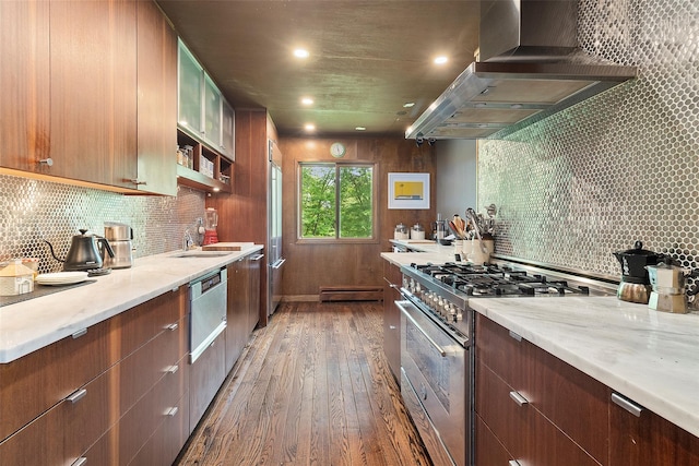 280 Salem Rd, Pound Ridge, NY 10576 - kitchen featuring stainless steel range, wall chimney exhaust hood, hardwood / wood-style floors, decorative backsplash, and recessed lighting