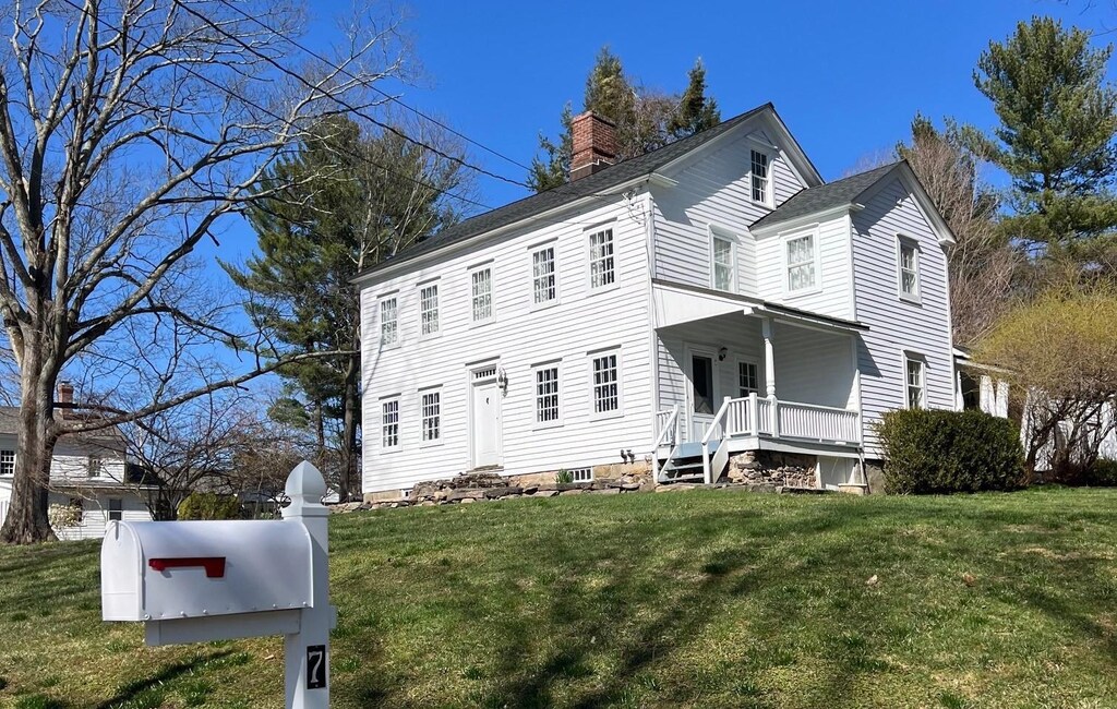 7 Main St, South Salem, NY 10590 - view of home's exterior with a yard and a chimney