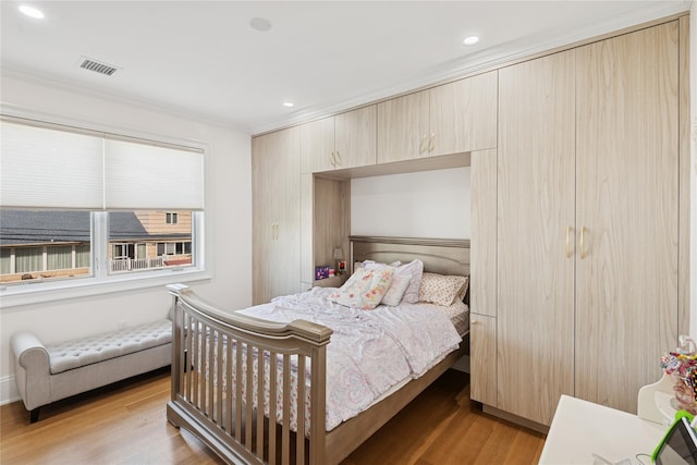 783 Oakleigh Rd, North Woodmere, NY 11581 - bedroom featuring visible vents, recessed lighting, light wood-style floors, and crown molding