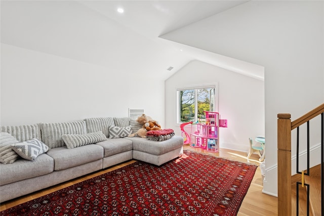 783 Oakleigh Rd, North Woodmere, NY 11581 - living room featuring vaulted ceiling, light wood-style floors, and recessed lighting