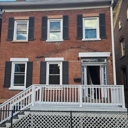 185 Mill St, Poughkeepsie, NY 12601 - back of property featuring brick siding