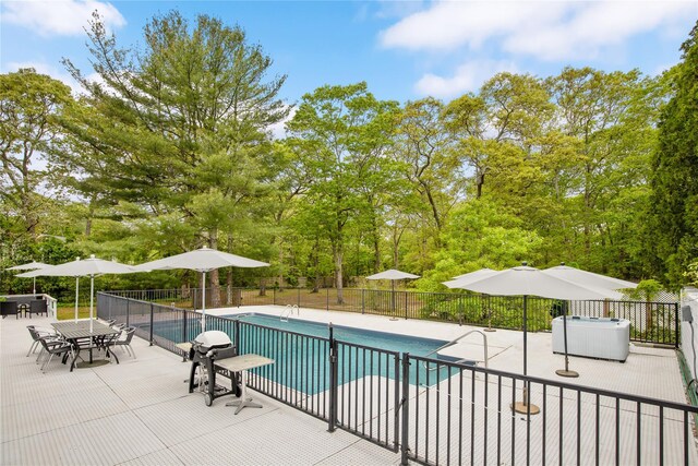 4 Evelyn Ct, Westhampton, NY 11978 - view of swimming pool featuring a patio area and view of scattered trees