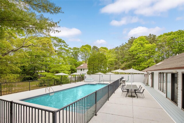 4 Evelyn Ct, Westhampton, NY 11978 - view of pool featuring view of scattered trees and a patio area