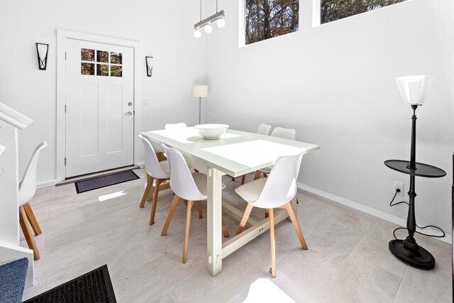 4 Evelyn Ct, Westhampton, NY 11978 - dining space with plenty of natural light and baseboards