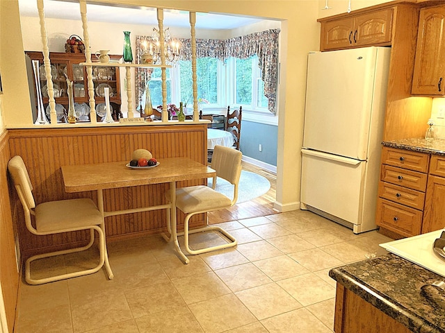 43 Glenwood Rd, New City, NY 10956 - dining space with a chandelier and light tile patterned flooring
