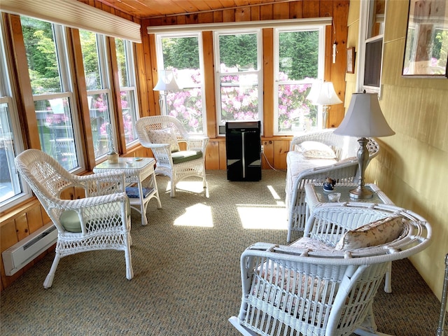 43 Glenwood Rd, New City, NY 10956 - sunroom featuring baseboard heating, carpet floors, wood ceiling, and wood walls