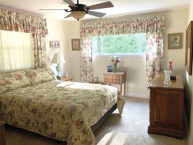 43 Glenwood Rd, New City, NY 10956 - bedroom with light colored carpet, ceiling fan, and baseboards