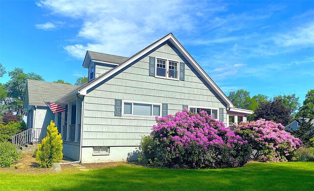 43 Glenwood Rd, New City, NY 10956 - view of side of home with a lawn