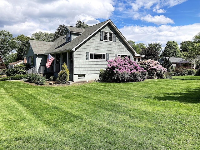 43 Glenwood Rd, New City, NY 10956 - view of side of property featuring a yard and roof with shingles