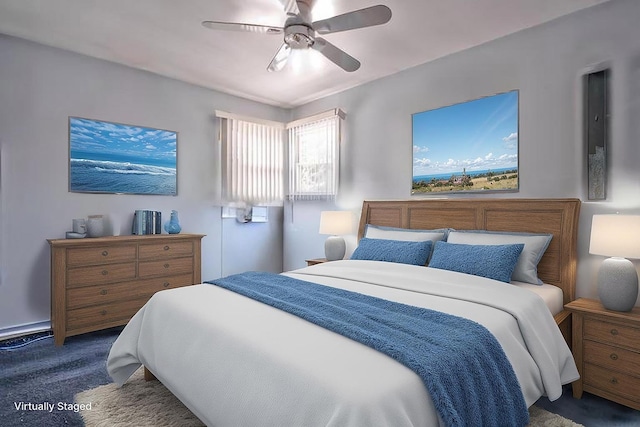 bedroom featuring ceiling fan and carpet flooring