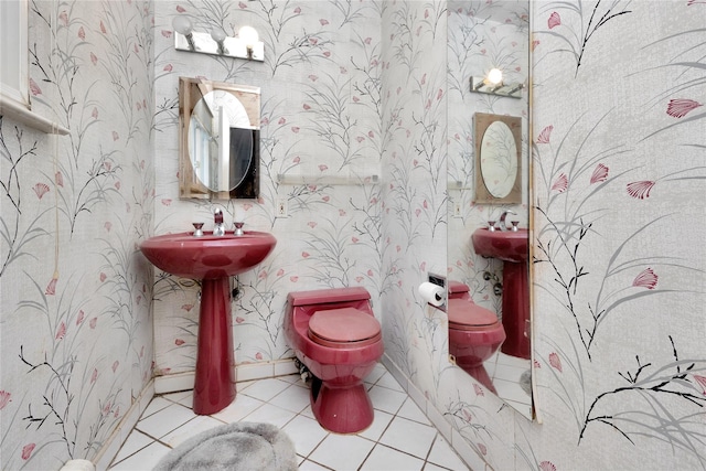 9 Ensign Dr, Massapequa, NY 11758 - bathroom with toilet, tile patterned flooring, a sink, and wallpapered walls