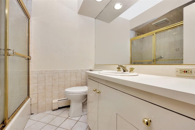 9 Ensign Dr, Massapequa, NY 11758 - full bath featuring shower / bath combination with glass door, tile patterned flooring, toilet, vanity, and baseboard heating