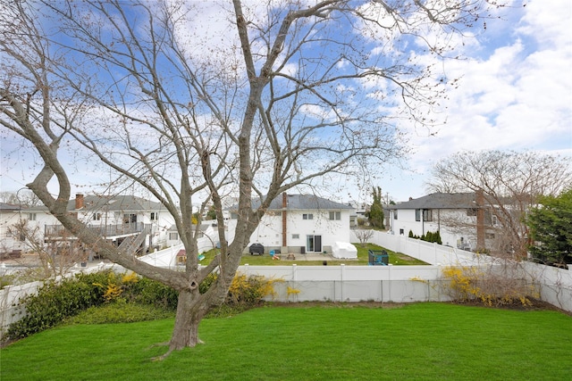 9 Ensign Dr, Massapequa, NY 11758 - view of yard featuring a fenced backyard and a residential view