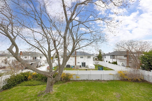 9 Ensign Dr, Massapequa, NY 11758 - view of yard with a fenced backyard and a residential view