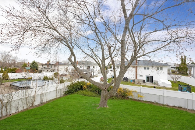 9 Ensign Dr, Massapequa, NY 11758 - view of yard featuring a residential view and a fenced backyard
