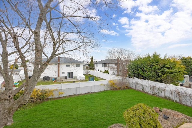 9 Ensign Dr, Massapequa, NY 11758 - view of yard featuring a fenced backyard and a residential view