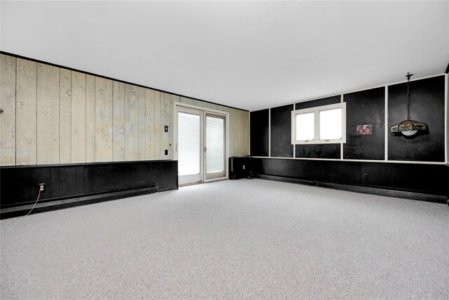 9 Ensign Dr, Massapequa, NY 11758 - unfurnished living room featuring carpet