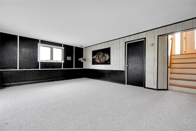 9 Ensign Dr, Massapequa, NY 11758 - spare room featuring carpet flooring and stairs
