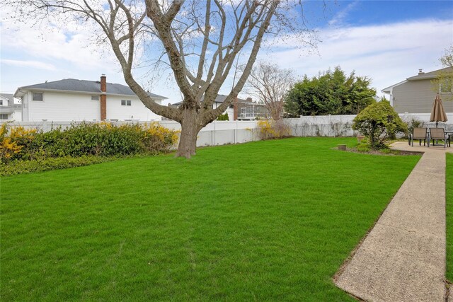 9 Ensign Dr, Massapequa, NY 11758 - view of yard with fence and a patio area