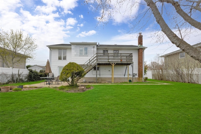 9 Ensign Dr, Massapequa, NY 11758 - rear view of house with fence, a lawn, a chimney, and a patio