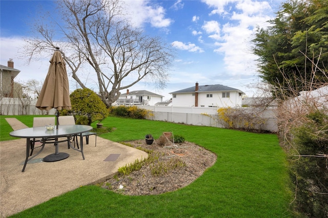 9 Ensign Dr, Massapequa, NY 11758 - view of yard featuring fence, a patio area, and outdoor dining space