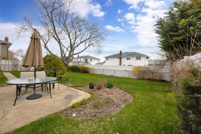 9 Ensign Dr, Massapequa, NY 11758 - view of yard featuring fence, outdoor dining space, and a patio
