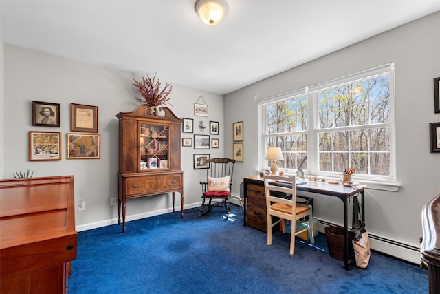 office area with dark carpet, a baseboard heating unit, and baseboards