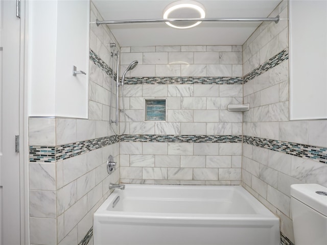 full bathroom featuring tile walls, shower / bathing tub combination, and toilet