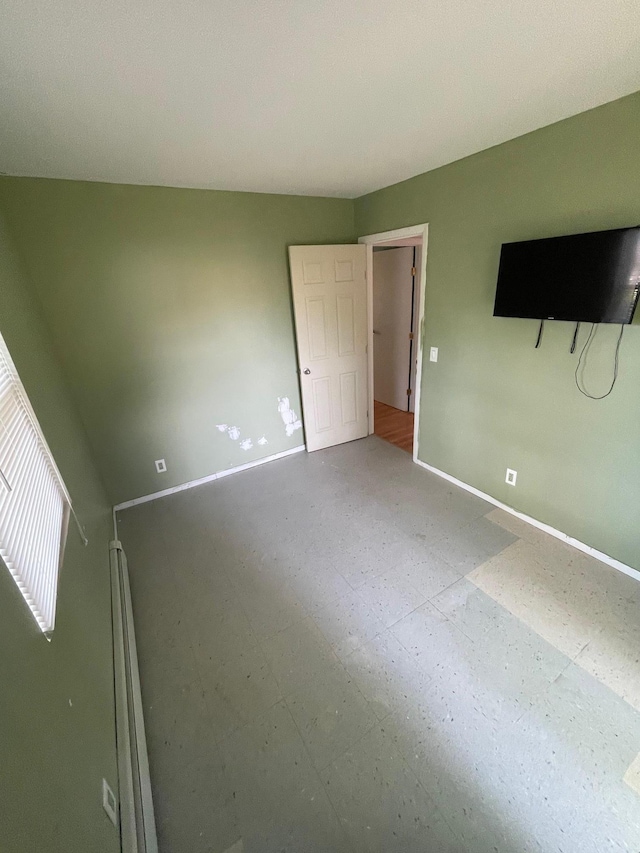1137 Namdac Ave, Bay Shore, NY 11706 - unfurnished bedroom featuring baseboards
