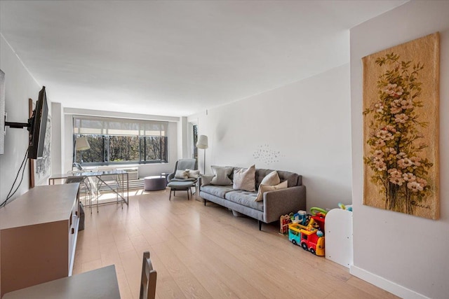 220-55 46th Ave Unit 3U, Bayside, NY 11361 - living room with light wood-type flooring and baseboards