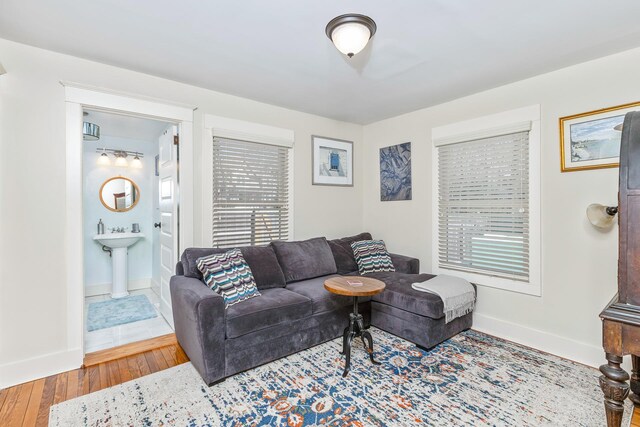572 Montauk Hwy, Westhampton Beach, NY 11978 - living room featuring wood finished floors and baseboards