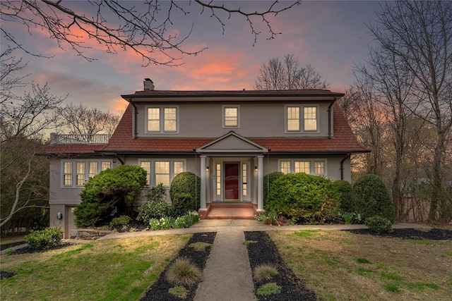 41 Euclid Ave, Hastings-On-Hudson, NY 10706 - view of front of house with a chimney and stucco siding