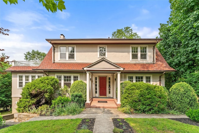 41 Euclid Ave, Hastings-On-Hudson, NY 10706 - view of front of property with stucco siding and a chimney