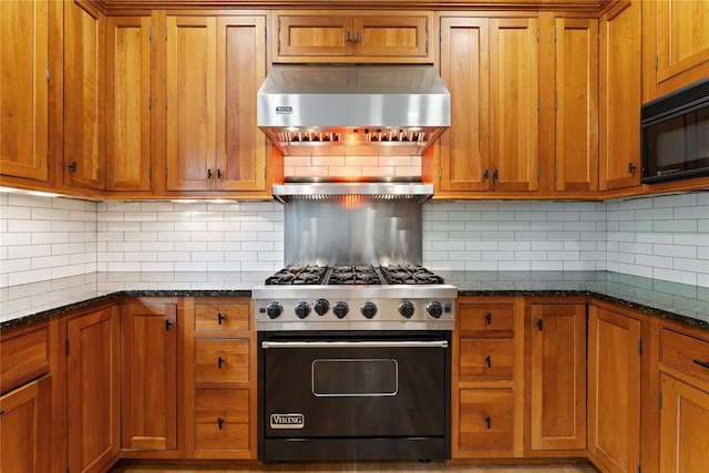 41 Euclid Ave, Hastings-On-Hudson, NY 10706 - kitchen with designer range, brown cabinets, extractor fan, and black microwave