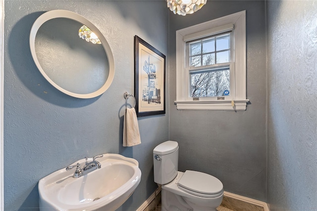 41 Euclid Ave, Hastings-On-Hudson, NY 10706 - half bath with toilet, a sink, and baseboards