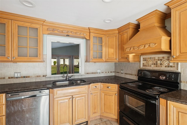 kitchen with dishwasher, a sink, custom range hood, black range with electric cooktop, and decorative backsplash