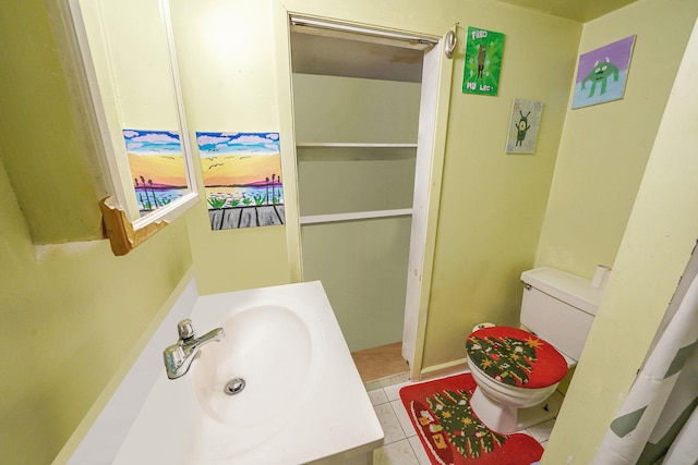 3205 Lafayette Ave, Bronx, NY 10465 - bathroom featuring a sink, toilet, and tile patterned flooring