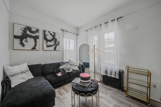 3205 Lafayette Ave, Bronx, NY 10465 - living room with light wood-type flooring and radiator