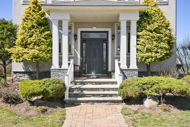 54985 Cr48, Southold, NY 11971 - property entrance featuring stucco siding and stone siding