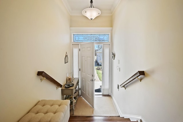 54985 Cr48, Southold, NY 11971 - entryway with wood finished floors, baseboards, ornamental molding, and a healthy amount of sunlight