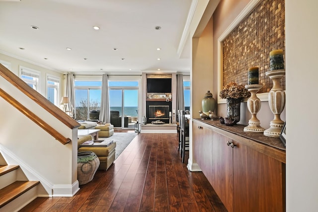 54985 Cr48, Southold, NY 11971 - hall featuring crown molding, recessed lighting, stairs, and dark wood finished floors