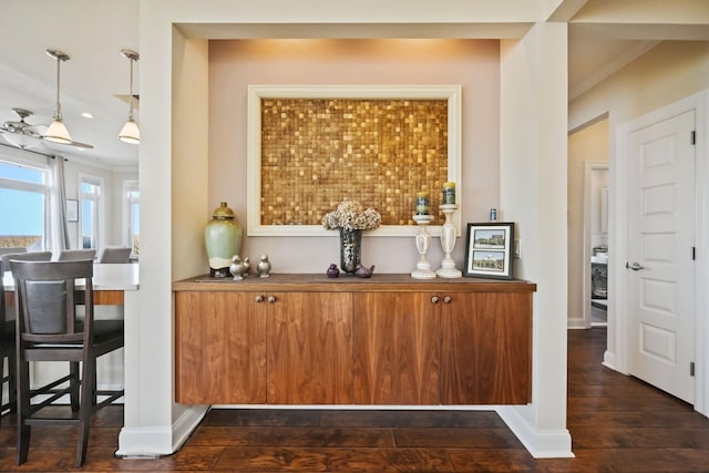 54985 Cr48, Southold, NY 11971 - bar featuring dark wood-type flooring, hanging light fixtures, baseboards, and recessed lighting