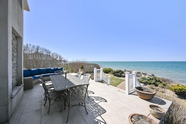 54985 Cr48, Southold, NY 11971 - view of patio with a water view, an outdoor living space, and outdoor dining area