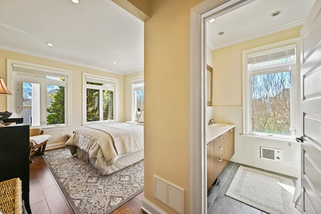 54985 Cr48, Southold, NY 11971 - bedroom featuring ornamental molding, multiple windows, and visible vents