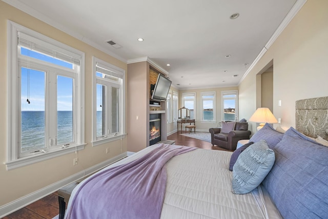 54985 Cr48, Southold, NY 11971 - bedroom with visible vents, baseboards, crown molding, recessed lighting, and wood finished floors