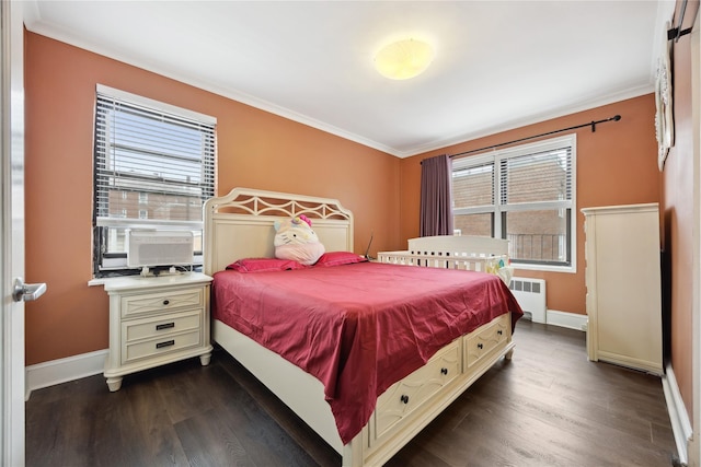 7211 110th St Unit 5G, Forest Hills, NY 11375 - bedroom with dark wood finished floors, radiator, baseboards, and multiple windows