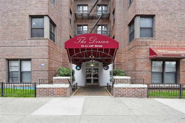7211 110th St Unit 5G, Forest Hills, NY 11375 - doorway to property featuring brick siding and french doors