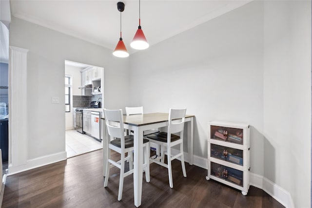 7211 110th St Unit 5G, Forest Hills, NY 11375 - dining room featuring baseboards and wood finished floors