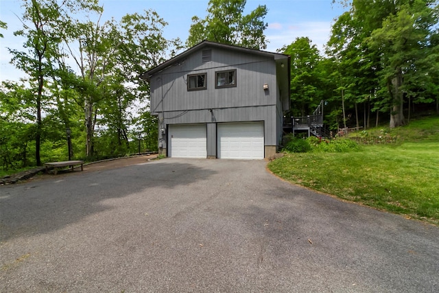 2358 Maple Ave, Cortlandt Manor, NY 10567 - view of property exterior with a yard and driveway